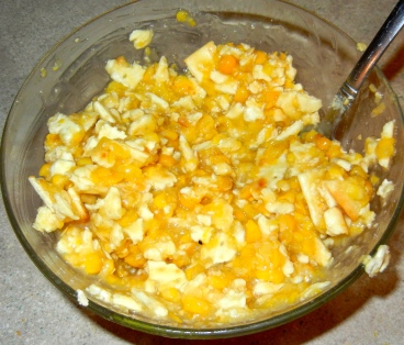Crush saltine crackers and mix in creamed corn